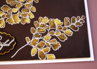 Gold Lame on black close up