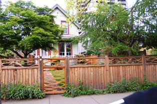 Victoria Home w wood fence