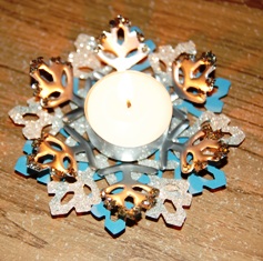 Snowflake votive in the light